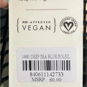 New Expressions blue and green vegan friendly purse